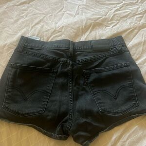 Black Levi’s shorts